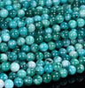 Natural Phoenix Stone Gemstone Grade AAA Round 6MM Loose Beads (D533)